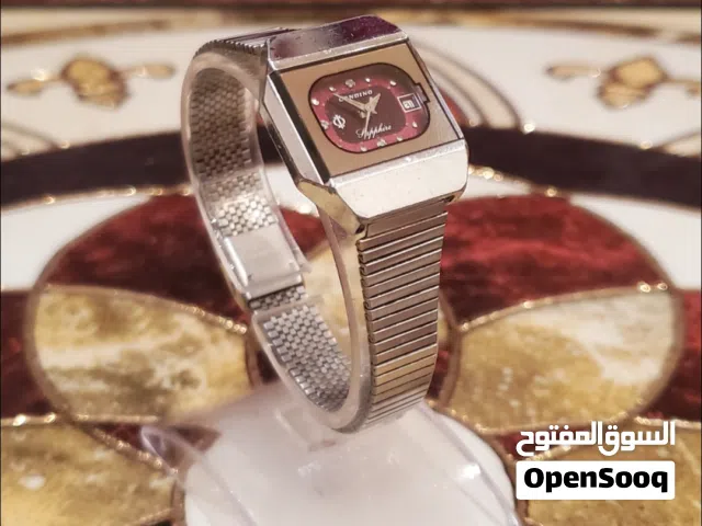 عرض خاص : ساعه ذهب ابيض مع ثلاثه افصاص الماس وحزام من الاستيل