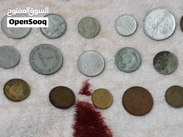مجموعة عملات قديمة نادرة (معدنية + ورقية) من دول مختلفة لهواة الجمع