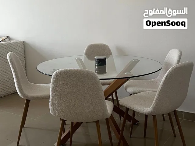Round Glass Dining Table with 5 Upholstered Chairs (price can be discussed) (serious buyers only)
