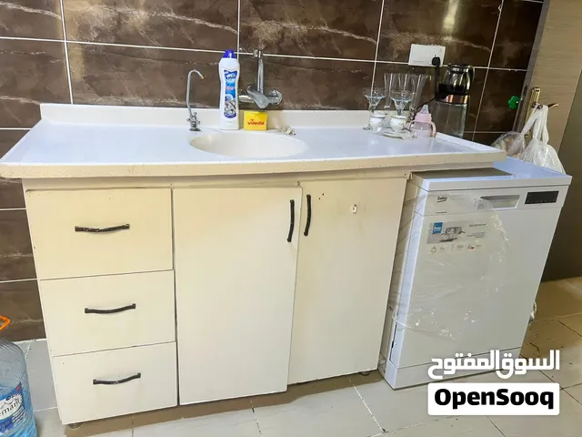 خزانة حوض المطبخ ونظام تنقية المياه