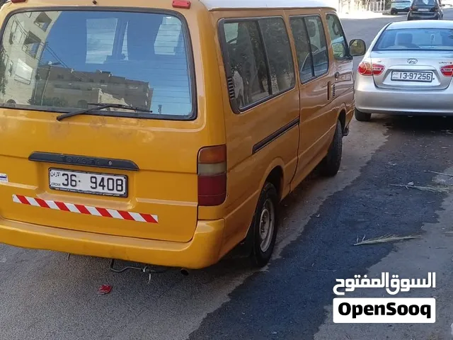 باص مدرسه صغير لون اصفر تويوتا هايس موديل ال2000