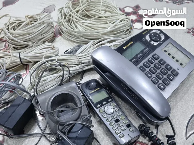 panasonic telecom + 6 cables+battery charger