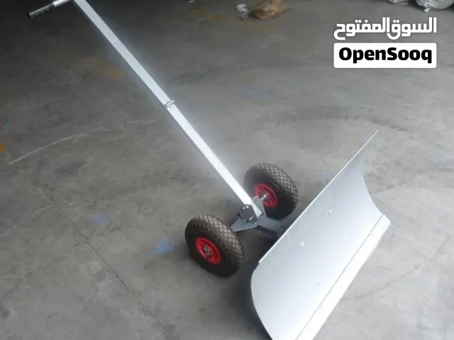 دافعە ثلج یدویة بعجلات