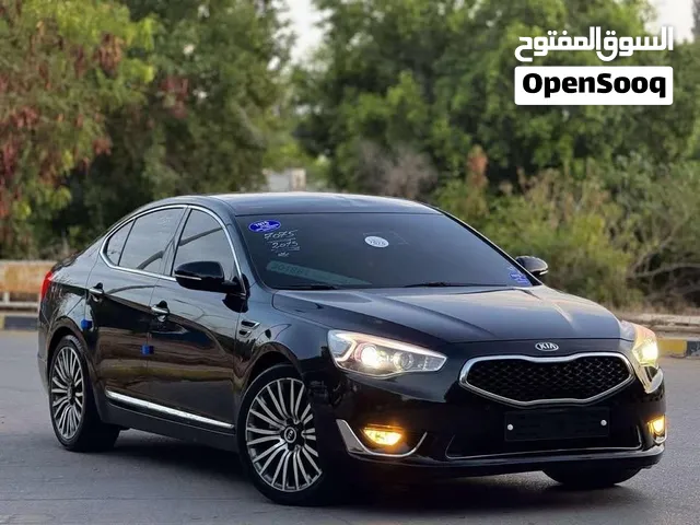 كيا كدينزا 2015 فلعرصة فل بجميع المزايا تنقص البنوراما صالون ابيض
