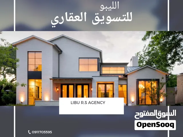 مبنى تجاري أو سكني للبيع واجهتين في حي الأندلس  في شارع واسع 15 متر