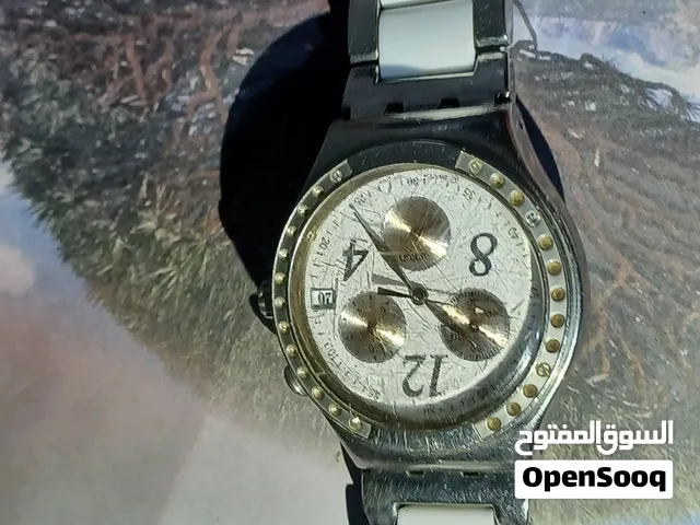 هذه ساعة يد سواتش أيروني دريم وايت (Swatch Irony Dreamwhite) بتصميمها الأنيق الذي يجمع بين الفولاذ ا