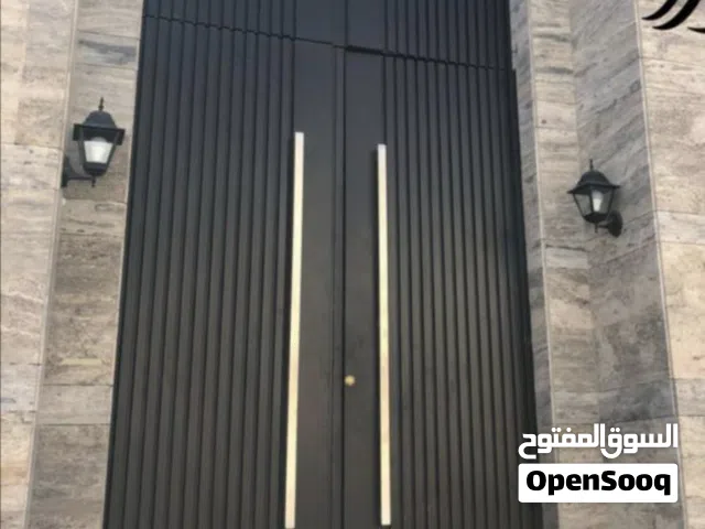 تفصيل ابواب حديد ودرابزين ومضلات وهناجر الدمام