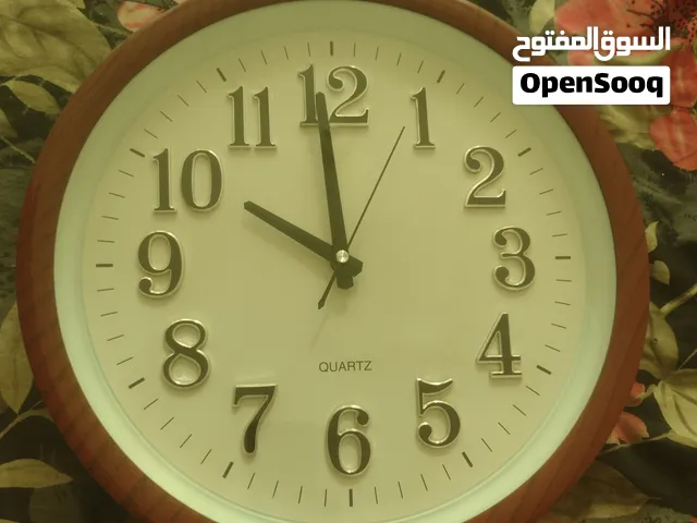 ساعة حائط عقارب