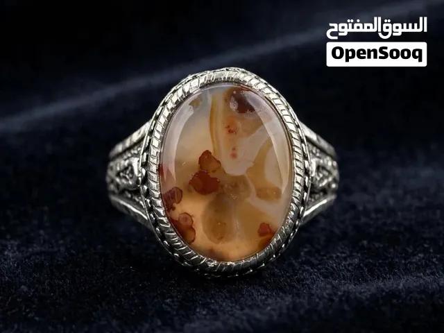 *خاتم فضة ثقيل مرصع بعقيق يماني بقراني