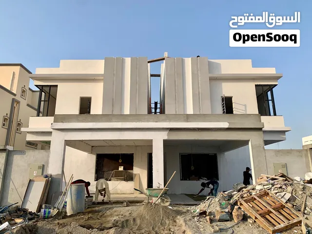 توين فيلا فاخرة بتصميم عصري وموقع استثنائي  بالمعبيلة الرابعة بالقرب من الشارع السريع