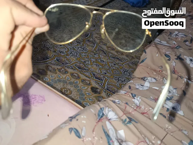 Stylo sunglasses classic gold-tone aviator sunglasses featuring a double brow bar and script brandin