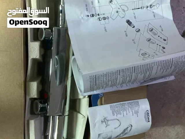 خلاط دوش جروهي Grohe مع منظم حراري (ثيرموستاتي) جديد بالكرتونة