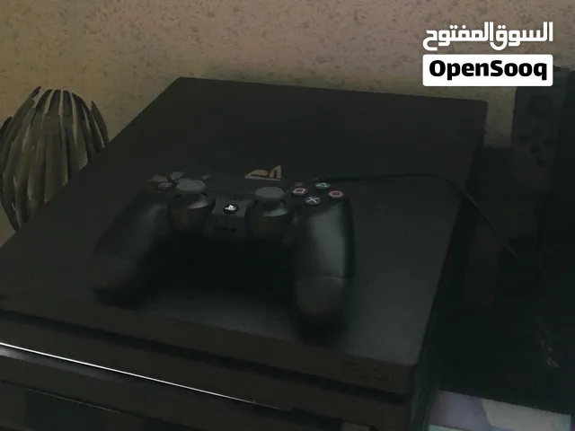 PS4 pro 1 tb with 1 controller and a plug and play mouse and a keyboard and a mouse pad