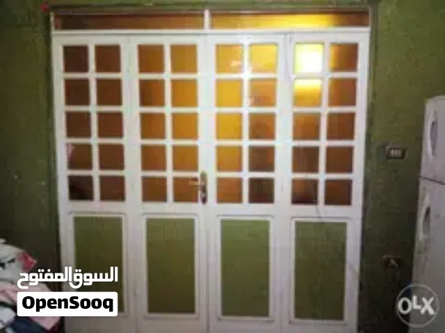باب كبير خشب زان 4 درف بالزجاج