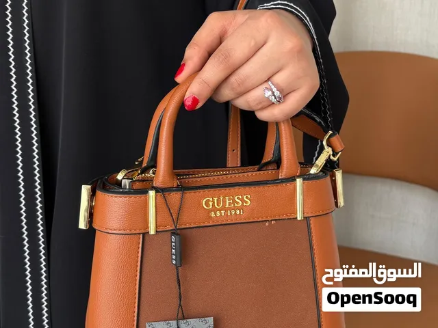 شنط يد Guss