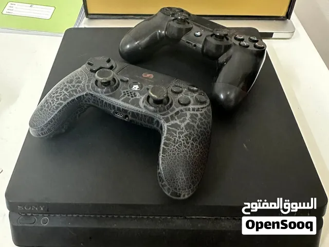 PS4 slim with two controllers  بليستيشن فور مع وحدتين تحكم وشريط GTA5