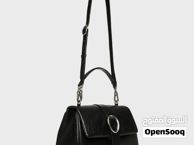 حقيبة أصليه ماركة ستيف  مادن بها حزام قصير وحزام اخر طويل للكتف
