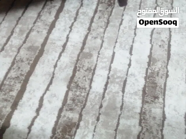 سجاد   تركي بحاله جيده جدا لون بني وبيج قياس 200 _290