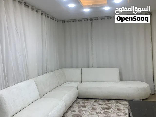 طقم كنب بشكل حرف L بحجم 9 مقاعد