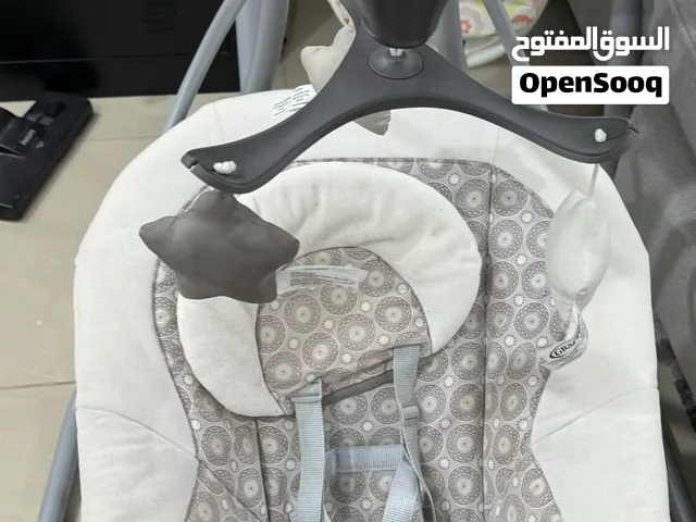 كرسي طعام ومرجيحة أطفال