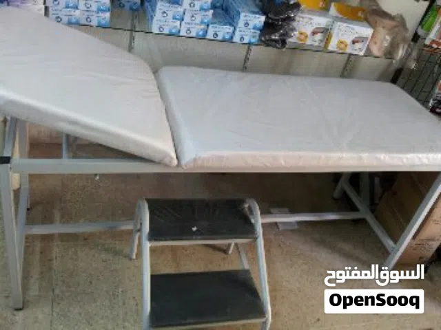 سرير فحص وعلاج