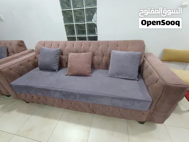 5 seater sofa set with cushions and center table