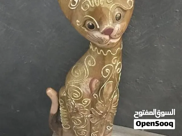 قطة من الخشب