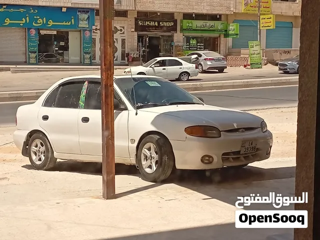سيارة هيونداي اكسنت 1995 صالون سيدان بحالة مستعملة مع فتحة بانوراما وبلوتوث