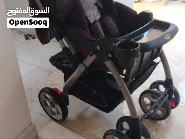 عربانة طفل جديده ماركة كود بيبي نظيفة جدا بس مفتوخة من جيس لون ماروني ورصاصي  مكان جزائر