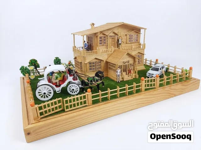 Hand crafted miniature and a Horse-drawn carriage