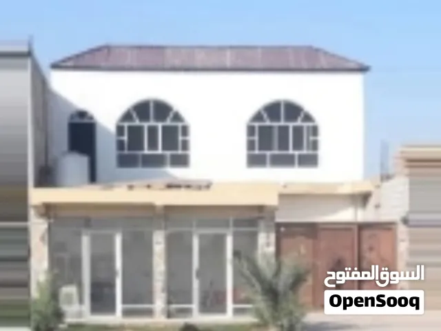 بيع دار مع محلات عدد 2 موقع تجاري على شارع عام شارع معمل سمنت الكوفه زراعي مكمل معامله للطابو جاهز ا