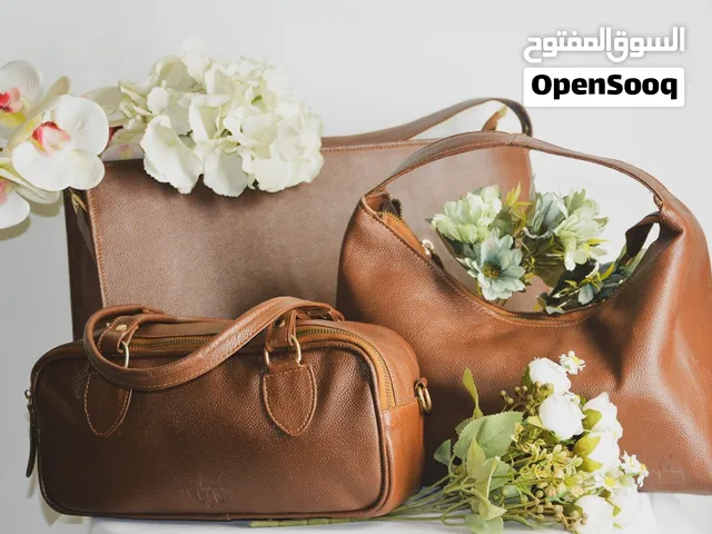 Leather Bags Different style from compact to large tote bags.