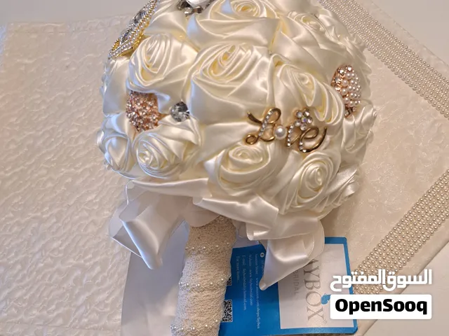 مسكه عروس فخمه ساتان ولؤلؤ وكريستال جديده غير مستعمله