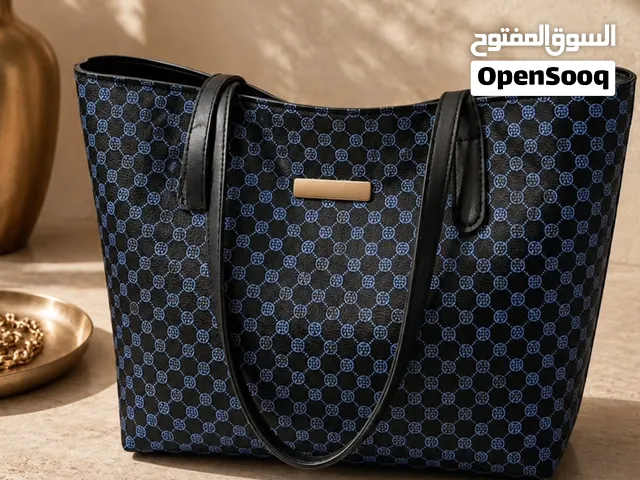 حقائب جلد يدوية كبيرة