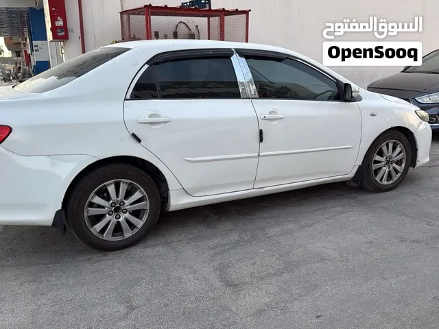 Toyota Corolla 2008 XLI manual 5 seater sunroof ATu window android penal screen LED headlights