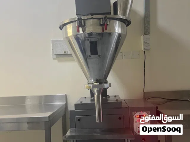 مكينة تعبئة للمواد الغذائية المطحونة