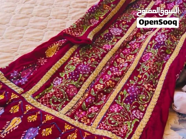 ثوب سمكة مطرز
