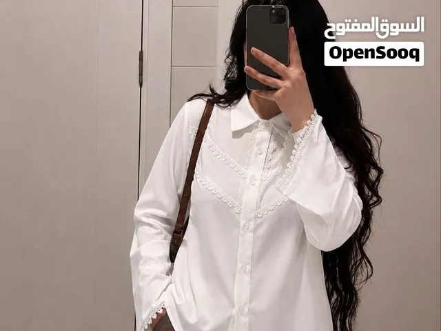 قميص مدرسي ابيض