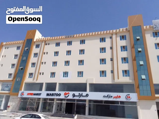 شقه للايجار بمنطقه الخوض السادسة أعلي هايبر مارتو غرفتين ومجلس  موقع مميز