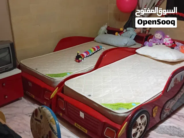ferrarri furniture's 2 beds 2 desk for babyroom used like new  with mattress