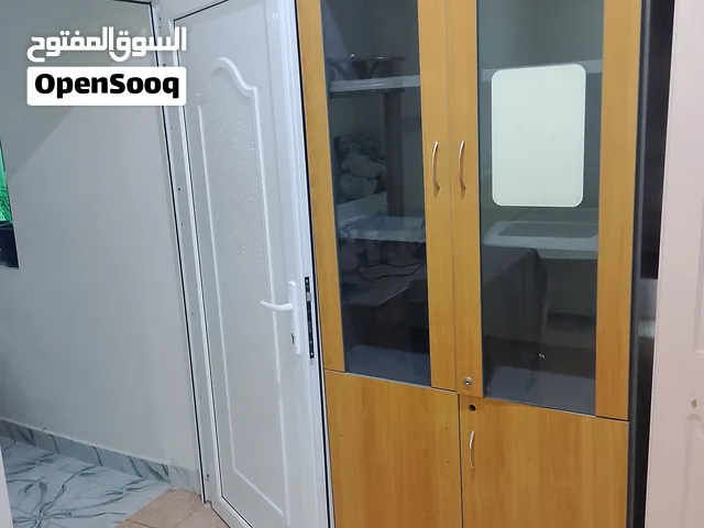 دولاب ملفات زجاجي مكتبي خشب ثقيل