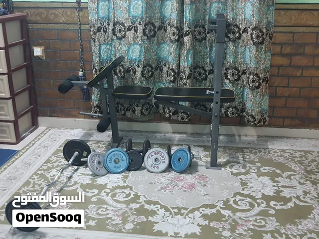 طقم كمال أجسام منزلي متكامل (مقعد + أوزان + بارات + دمبلز)