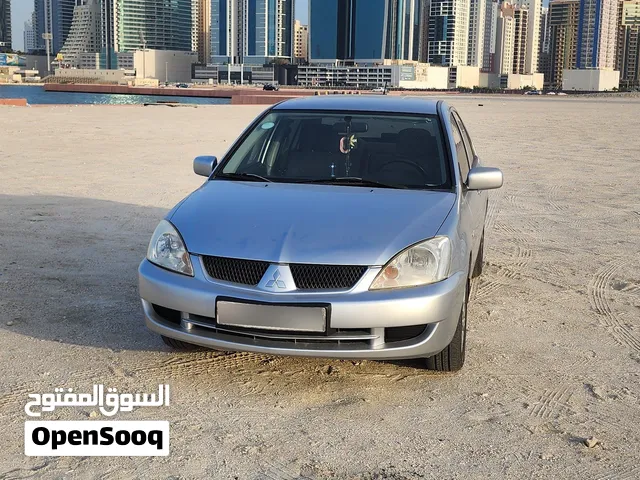 Mitsubishi Lancer GLX 2010 for urgent sale