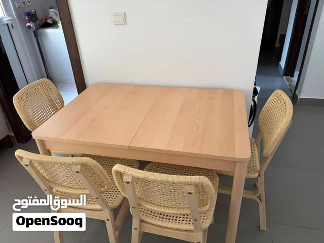 Extendable wooden table with 4 chairs IKEA