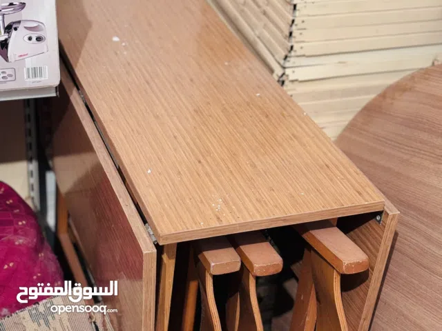 طاولة لوح تطبق وتنفتح