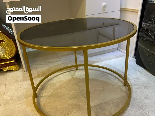 Gold sofa table with glass