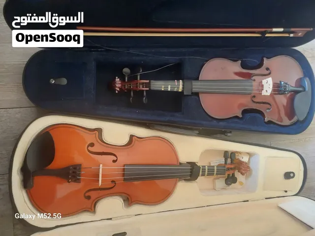 كمان عدد 2 للبيع 4/4 مع شنطهم واحد منهم فتنس