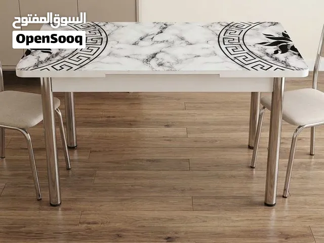 طاولة طعام زجاجية فخمة بنقش رخامي فرزاتشي ( شبه جديده )
