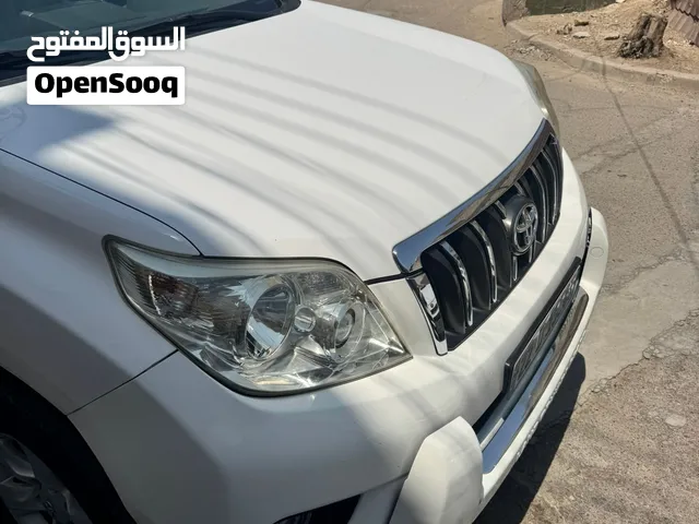 ابرادو موديل 2013 رقم اربيل بسمي ماشية 146500 حلوه سيارة لون ابيض 4 سلندر