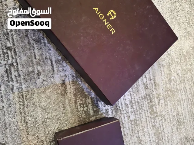 علبة Aigner